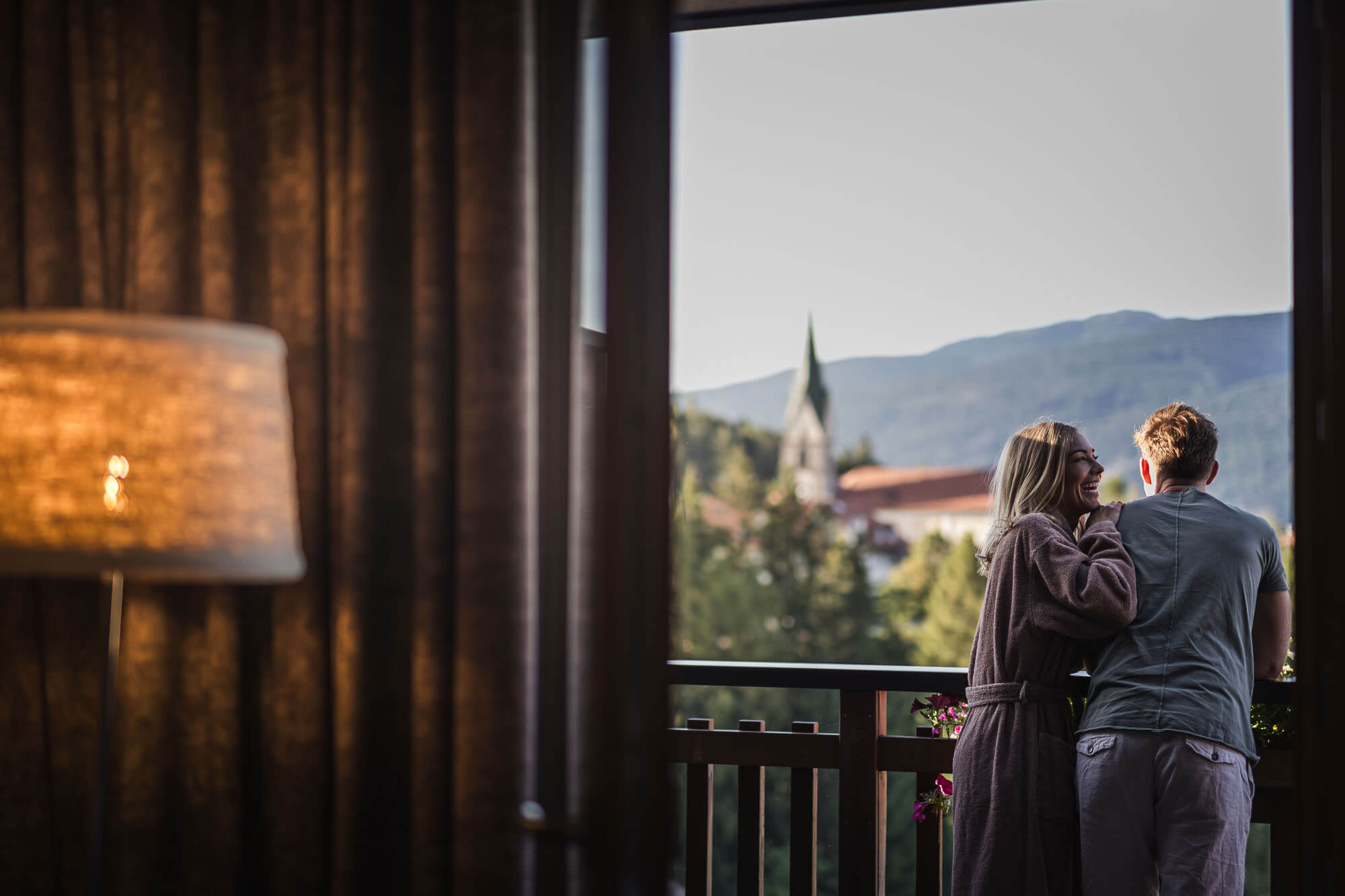 Man & woman on balcony - View of Terento - Hotel Terentnerhof