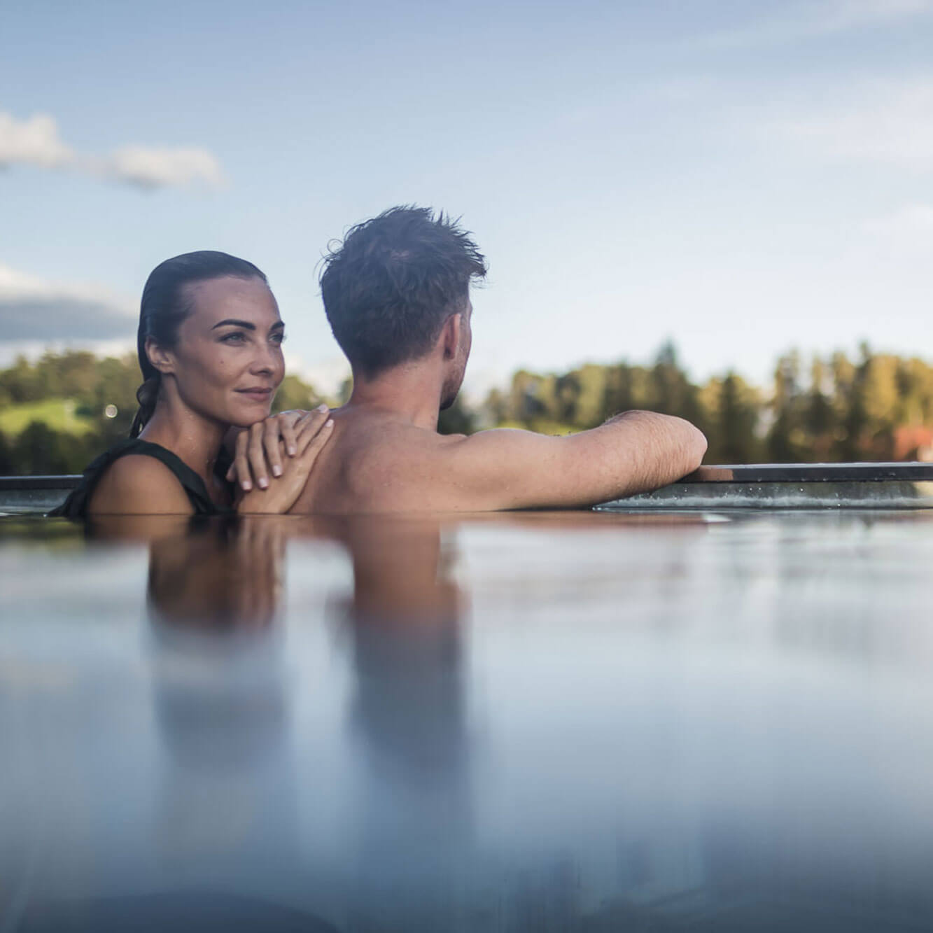 Reviews - Outdoor pool with man & woman - Hotel Terentnerhof