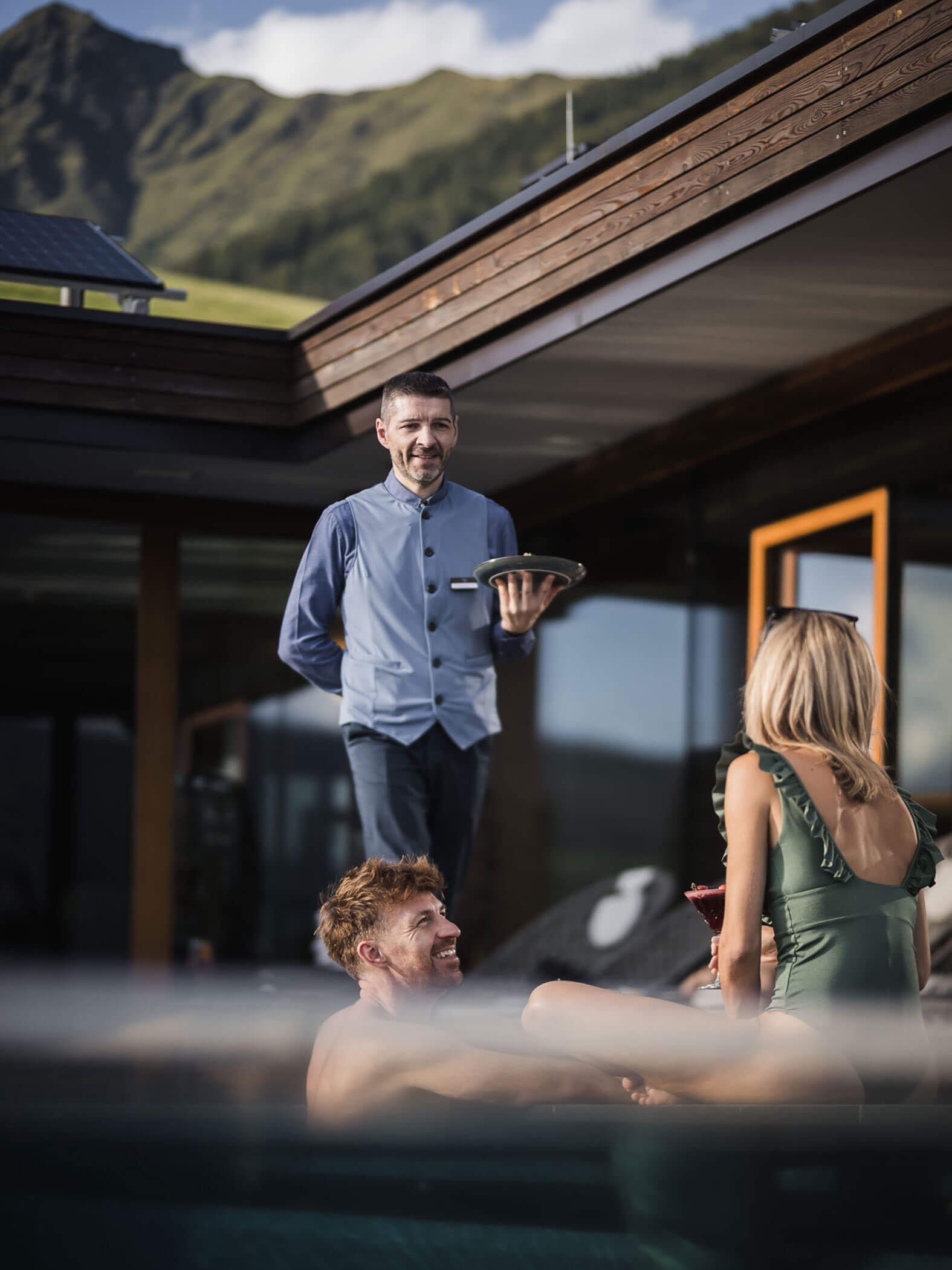 Serving man & woman at the pool - Hotel Terentnerhof